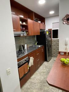 Η κουζίνα ή μικρή κουζίνα στο Apartamento moderno en cali