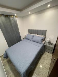 Ένα ή περισσότερα κρεβάτια σε δωμάτιο στο Apartamento moderno en cali