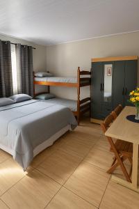 Foto de Studio Central Ar - Tv - Wifi - Perto da Ponte da Amizade - Seu Lugar em Foz