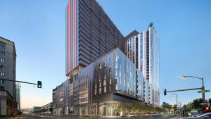 een weergave van een hoog gebouw in een stadsstraat bij Sentral Sol Modern in Phoenix