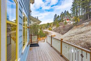 a balcony of a house with a view of a road at Chalet Haesler Sr - Edelweiss Village in Golden