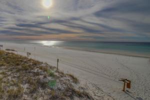 a view of a beach with a fence and the ocean at Bahia #4110 in Destin