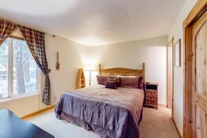 En eller flere senge i et værelse på Cozy Grove