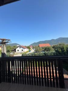 a view of the mountains from the balcony of a house at Privat vila 303 in Martin