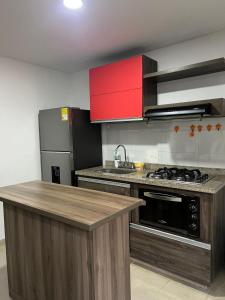 Η κουζίνα ή μικρή κουζίνα στο Encanto Del Parque