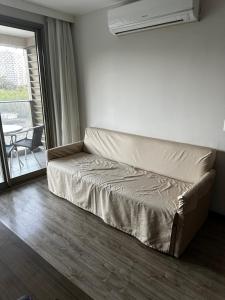 En eller flere senge i et værelse på Flat - Barra Olímpica