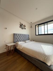 Ένα ή περισσότερα κρεβάτια σε δωμάτιο στο 2BR Prestigia Hay Riad with swimmingpool