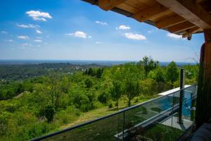 a view from the balcony of a house at Holiday House Ad Astra in Čučerje