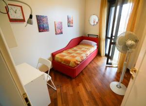 Giường trong phòng chung tại DOMUS Hospitalis -- vicino Malpensa e Milano - LIUC