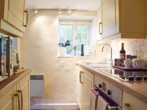 Kuchyň nebo kuchyňský kout v ubytování Westover Cottage