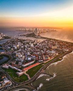an aerial view of a city next to the ocean at Hostal La FLora in Cartagena de Indias