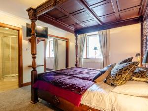 Ένα ή περισσότερα κρεβάτια σε δωμάτιο στο Dalgarven Spa House