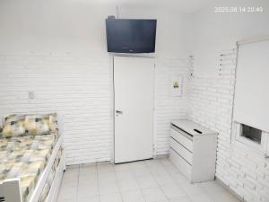 Ένα ή περισσότερα κρεβάτια σε δωμάτιο στο Mí Casa D1
