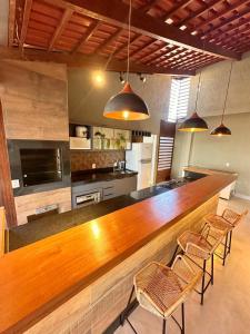 Kuchyň nebo kuchyňský kout v ubytování Rancho Palmeira Diversão e Descanso em um Só Lugar