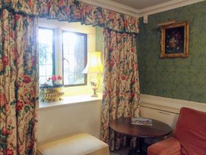 Posezení v ubytování The Coach House