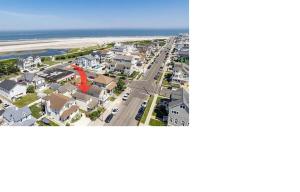 an aerial view of a street with houses and the beach at NWW single 2nd ave Hereford Inlet Anglesea in North Wildwood