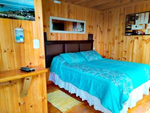 Postel nebo postele na pokoji v ubytování Cabañas y Hostal Karibe