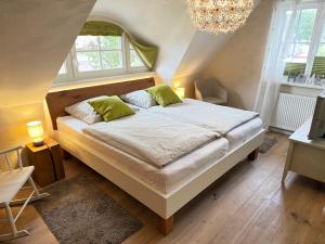 Postel nebo postele na pokoji v ubytování Haus Windflüchter