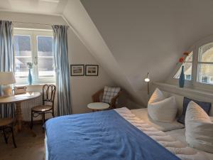 Giường trong phòng chung tại Haus Wikinger