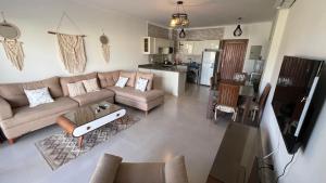 Телевизор и/или развлекательный центр в Gaia Chalet-Cozy Family Stay