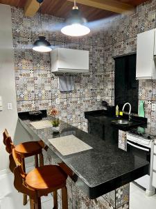 Dapur atau dapur kecil di Flat aconchegante a 50m da orla