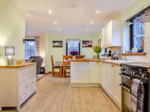 Køkken eller tekøkken på Bunchrew Farm Cottage