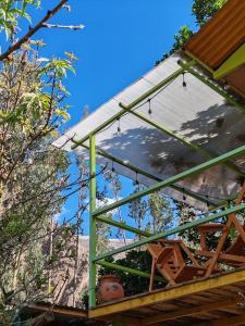 a view of the roof of a house at Vista a la Montaña Habitación Pet Friendly in Ollantaytambo +1 photo