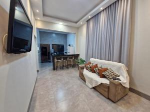 Et tv og/eller underholdning på Casa Alves Aluguel de Temporada Próx Hospital do Amor em Barretos SP Com Suíte e Ar condicionado