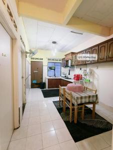 Kuchyň nebo kuchyňský kout v ubytování ZRC Homestay