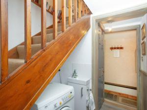 a staircase in a tiny house at Wheal Trenwith Cottage in St Ives +14 photos