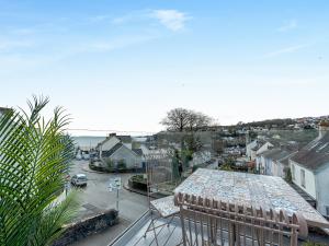 a balcony with a view of a city and a street at Beachey View - Uk43058 in Saundersfoot +28 photos