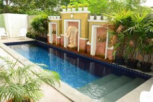 Bazén v ubytování Emerald Hotel Chonburi nebo v jeho okolí