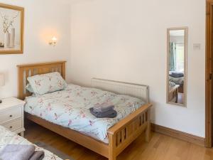 Voodi või voodid majutusasutuse Fawnlea Cottage toas +9 fotot