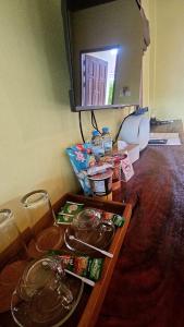 a table with food on it with a mirror at คีรีนคร บางพระ รีสอร์ท in Ban Huai Kum (1) +14 photos