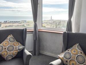 Et opholdsområde på Lloyds Cottage + 22 billeder