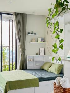 Ένα ή περισσότερα κρεβάτια σε δωμάτιο στο Ecopark Lushy Stay - Garden in the Cloud