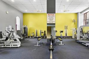 a gym with several treadmills and exercise machines at Redfern 2Br Near CBD Shopping Center with Pool & Gym in Sydney