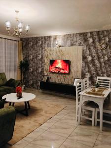 Posezení v ubytování Eldoret Cozy 2-Bed Along Kisumu Road Near Maya + 1 fotografie