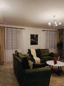 Posezení v ubytování Eldoret Cozy 2-Bed Along Kisumu Road Near Maya
