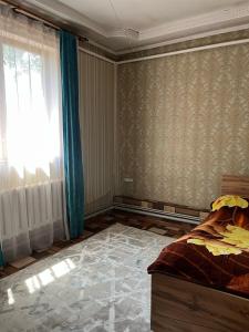 Ένα ή περισσότερα κρεβάτια σε δωμάτιο στο Hostel