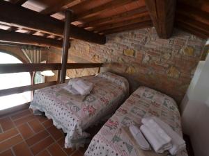 Ένα ή περισσότερα κρεβάτια σε δωμάτιο στο Charming Retreat in Montaione +4 φωτογραφίες