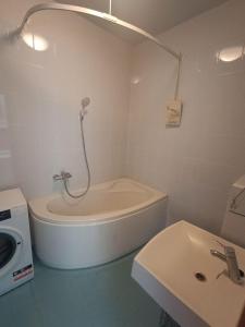 Phòng tắm tại Gintaris Apartaments