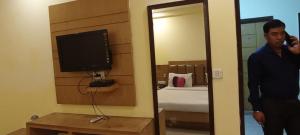 TV a/nebo společenská místnost v ubytování Hotel Aura palace Dx