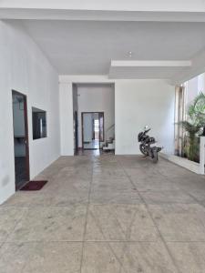 TV a/nebo společenská místnost v ubytování Rivera Nest Serviced Apartment