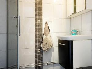 a bathroom with a sink and a shower at 2 person holiday home in STRÖMSTAD-By Traum in Strömstad