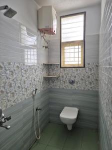 Koupelna v ubytování Rivera Nest Serviced Apartment