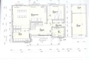 ein Grundriss eines Gebäudes mit Zeichnungen in der Unterkunft Kapitänsweg 17 in Ostseebad Karlshagen