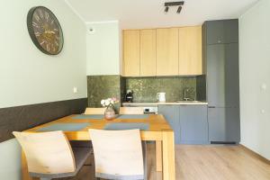 Η κουζίνα ή μικρή κουζίνα στο Apartament MK Sosnowskiego 9