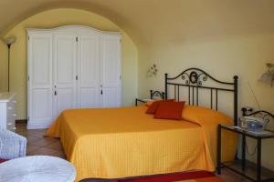 Ένα ή περισσότερα κρεβάτια σε δωμάτιο στο Apartments Casa Tamas, Limone