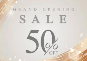 a sign that says grand opening sale off at M Candy Hotel in Melaka